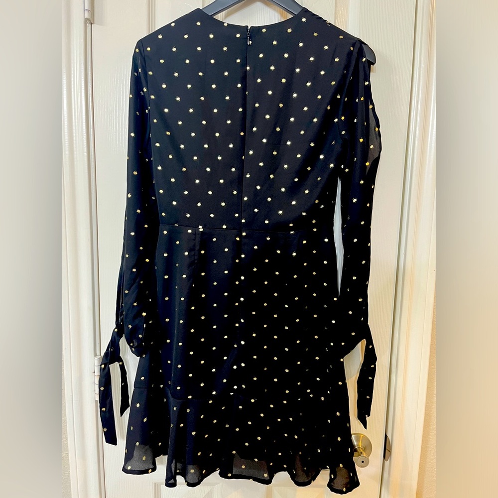 GB size small long sleeve black dress.